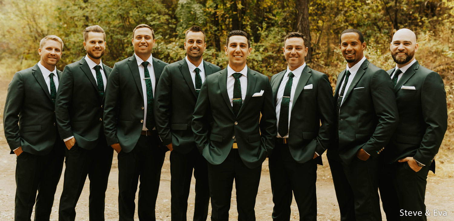 groomsmen in green suits