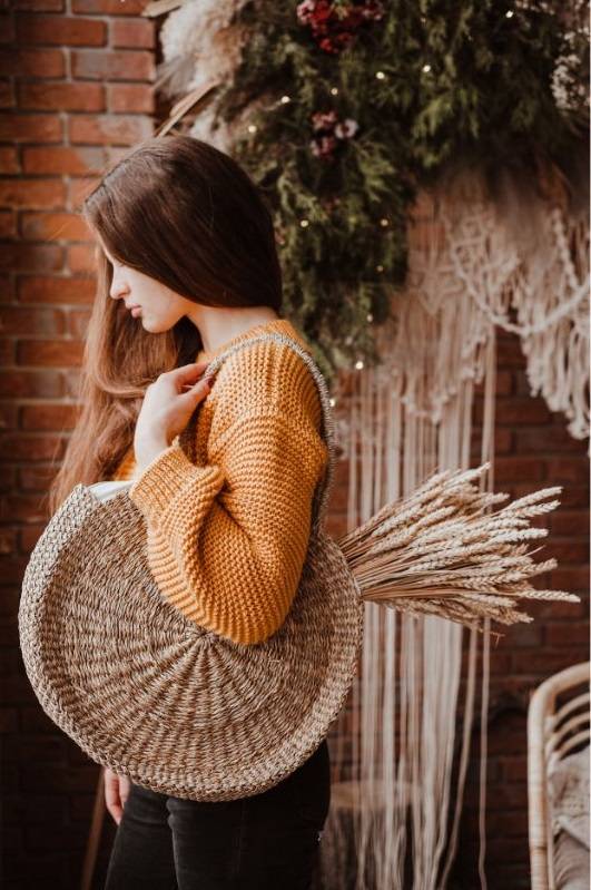 woman wearing bag made of natural materials