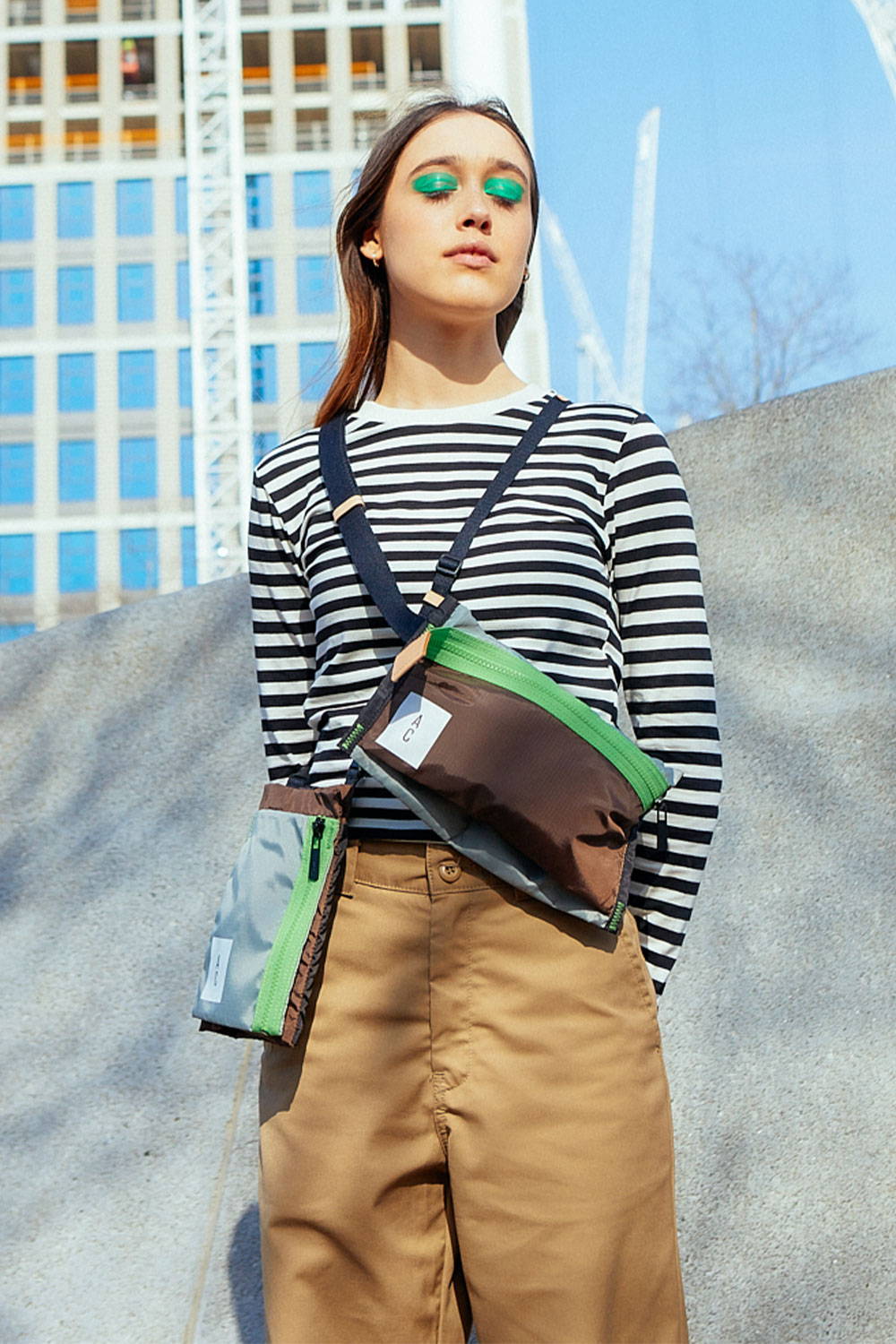 Ally Capellino SS22 Packable Collection Campaign Model Wearing Herbert and Herve Crossbody Bags