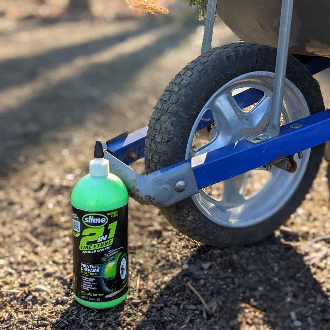 Slime 2-in-1 Tire & Tube Sealant with a Wheelbarrow tire