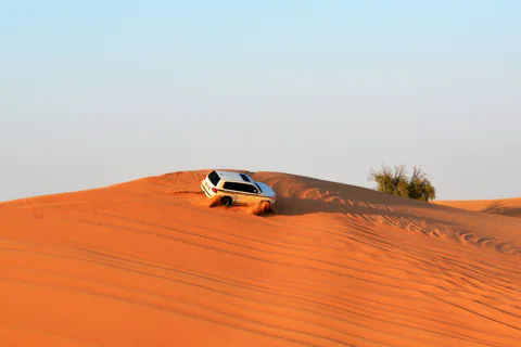 Red Dune Safari w/ Sandboarding, Camel Riding and BBQ