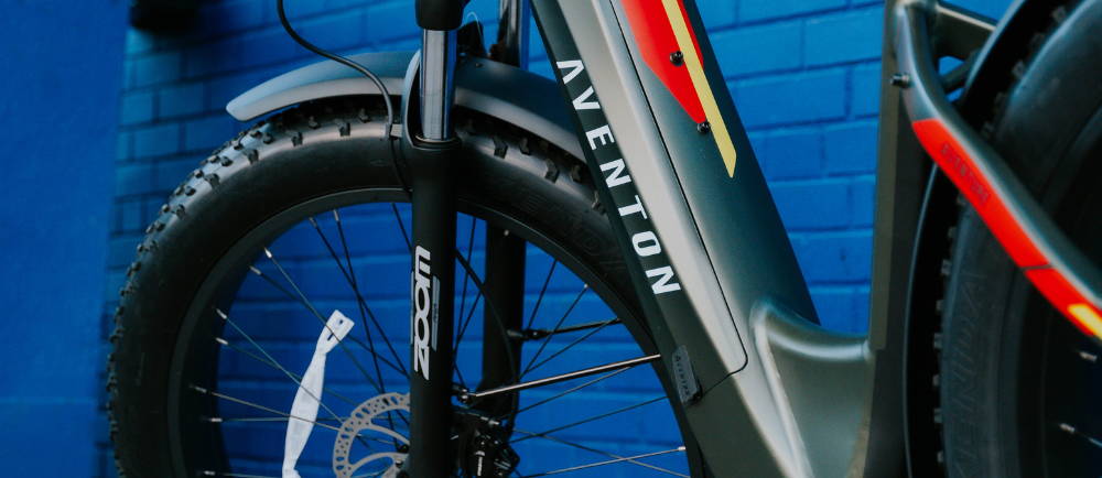 a green Aventon Aventure electric fat tire bike