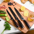 Seido Japanese master chef knife precisely slicing tomatoe