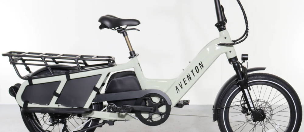 a white aventon abound electric cargo bike