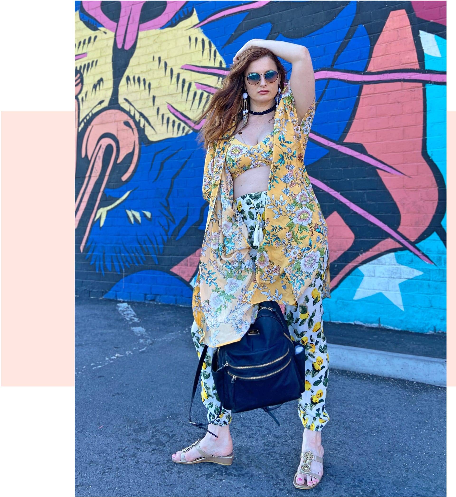 Rachel Reilly is wearing SKYE's Liz top and Nelly kimono from the Penelope collection.