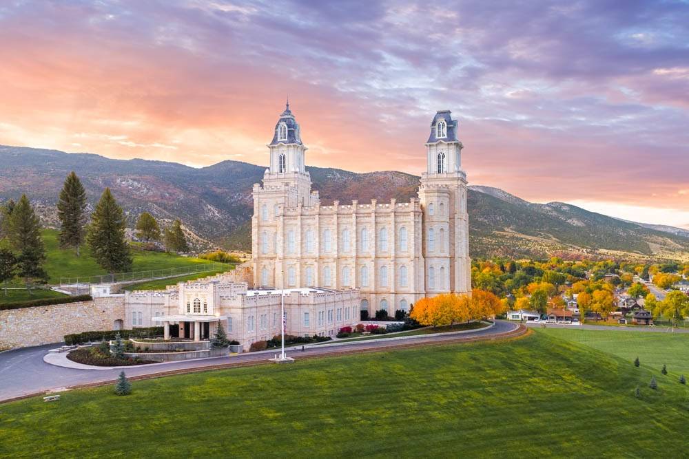 Photo of the Manti LDS Temple against a sunset.