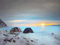 Hiking with snowshoes in winter and pitching your Mount Trail tent at sunset.