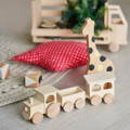 Cute wooden Montessori animal and train toys. 