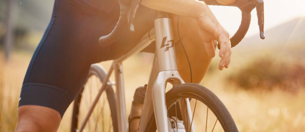 Close up of rider and handlebars of LaPierre electric road bike