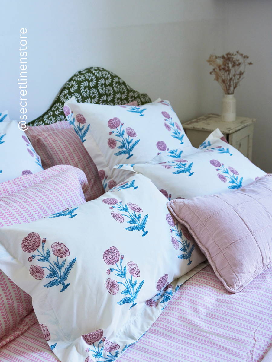 Secret Linen Store floral pillowcases and striped bedding