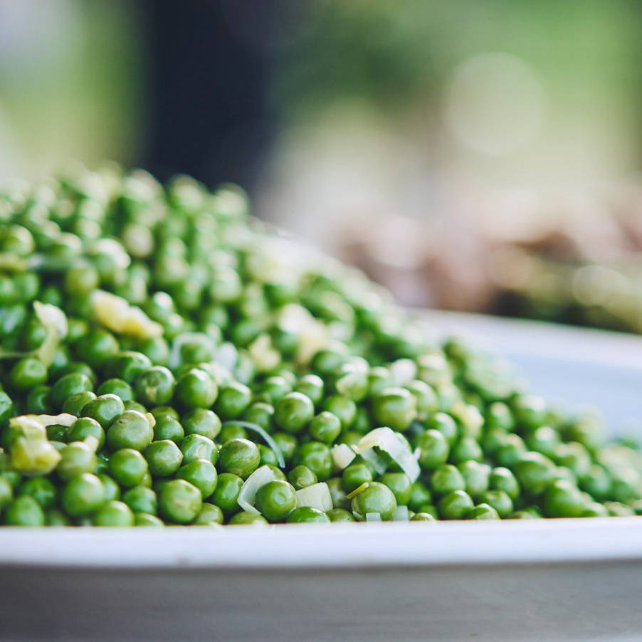 plate of peas from farm-to-table event hosted by Stick & Ball