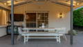 Outdoor wall lighting enhancing covered patio and dining area in Rouse Hill by Havit