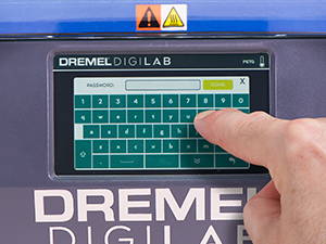 Image of Dremel 3D45 touch screen showing a full keyboard with a persons finger touching letters