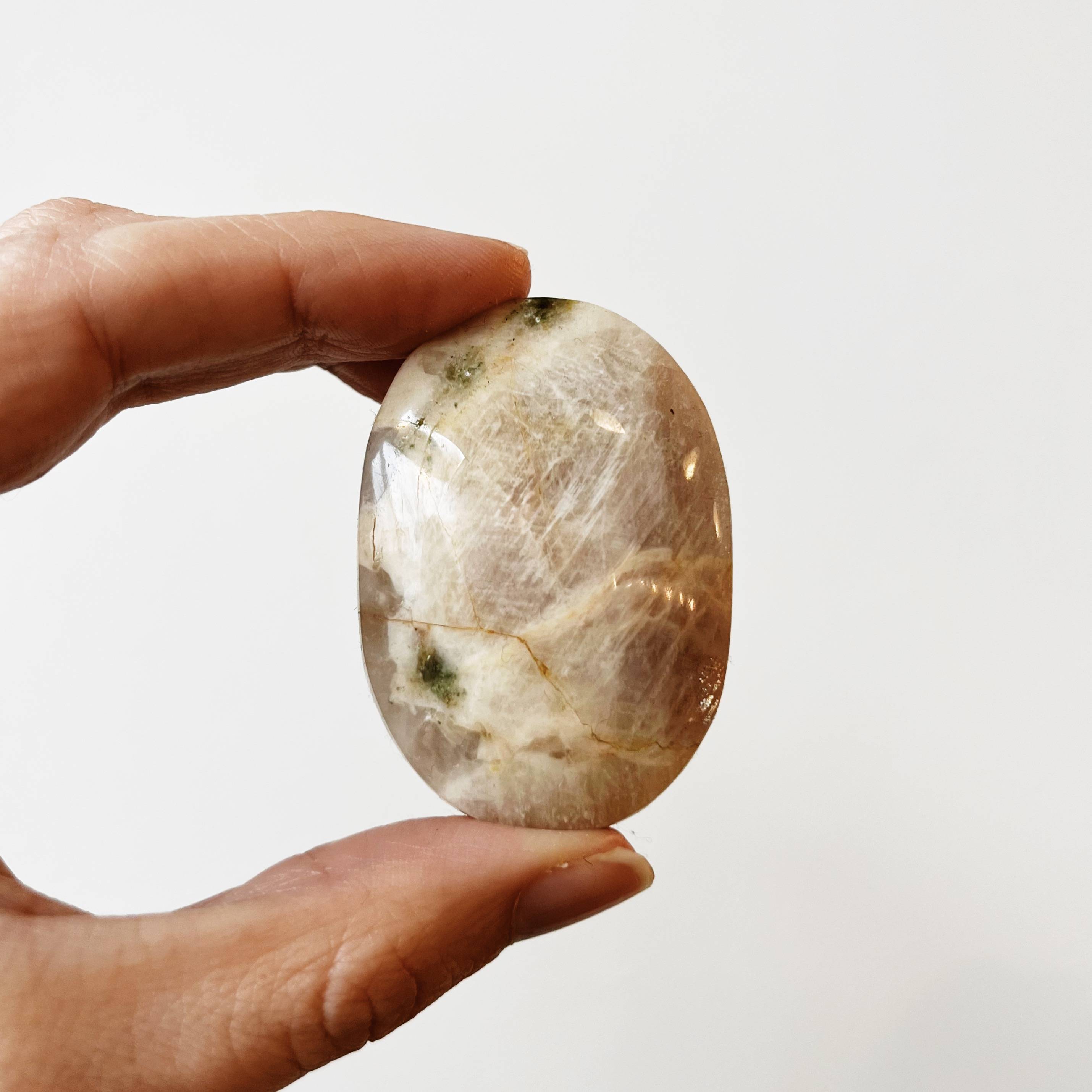 Crystals for Gemini: Sunstone Moonstone Palm Stone