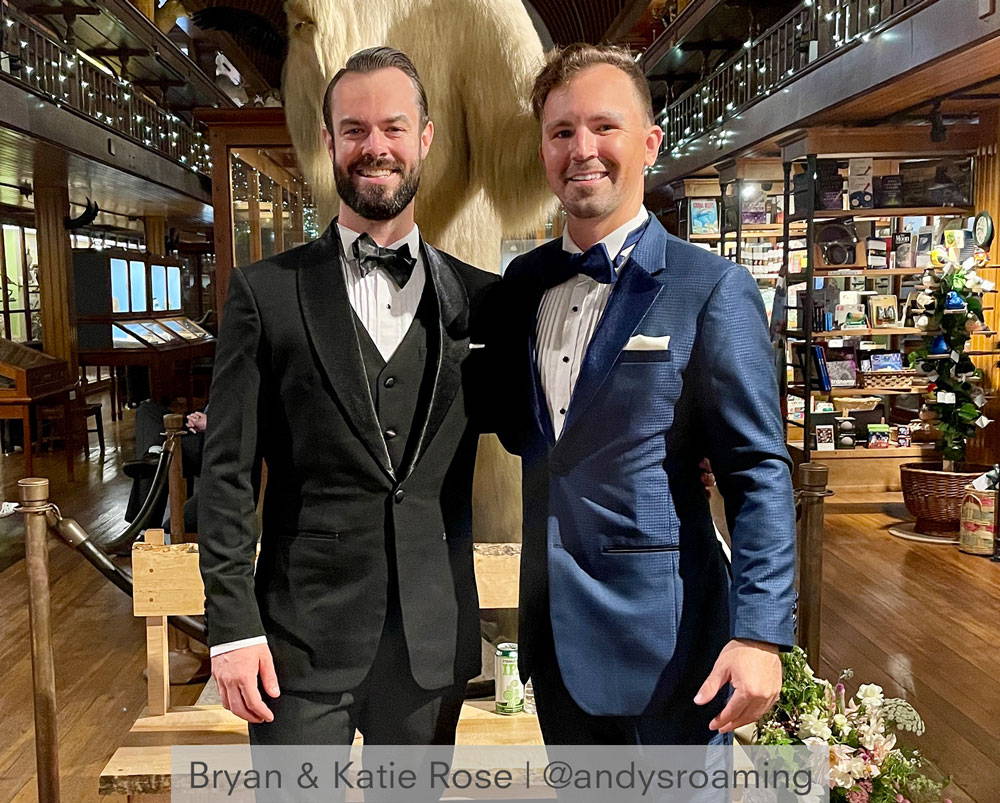 two grooms in tuxedos
