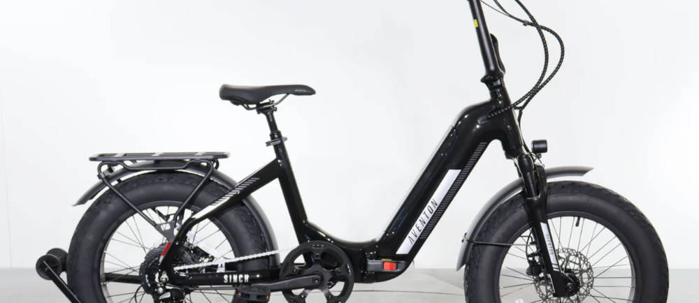 a black Aventon Sinch.2.5 electric folding bike