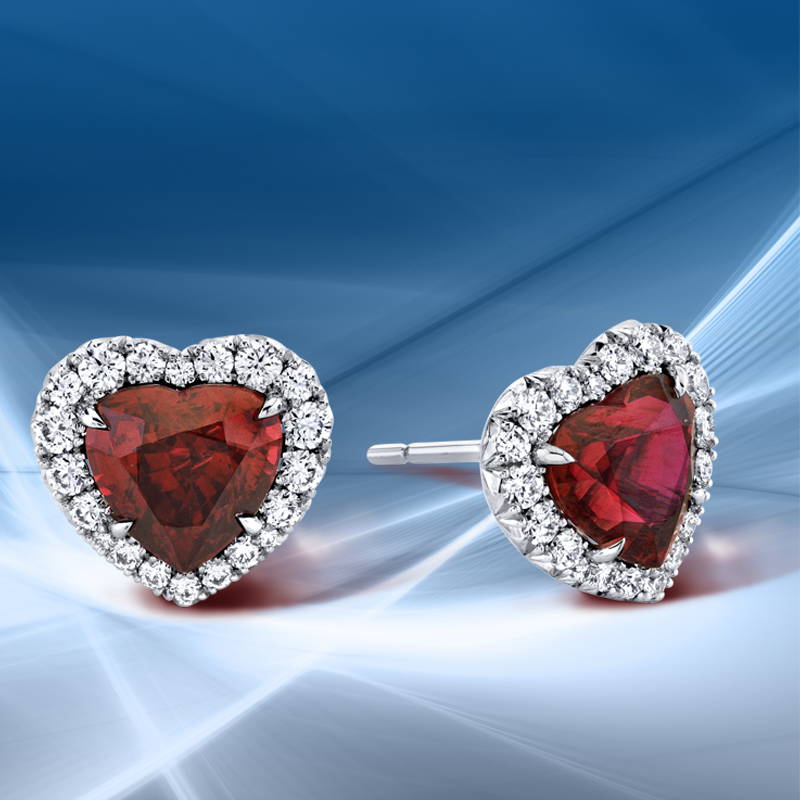 Heart shaped rubies with diamond halo earrings