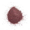 A powdered pile of faded red sumac