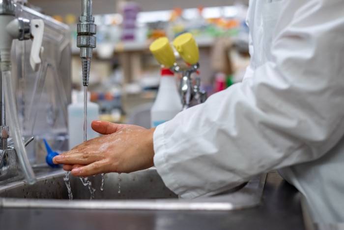 Photos of someone washing their hands