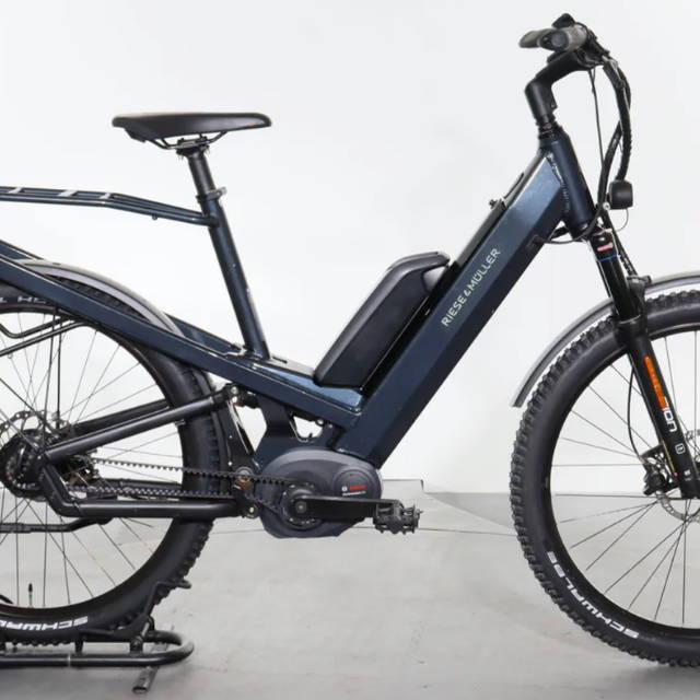 a blue Riese & Müller electric city bike