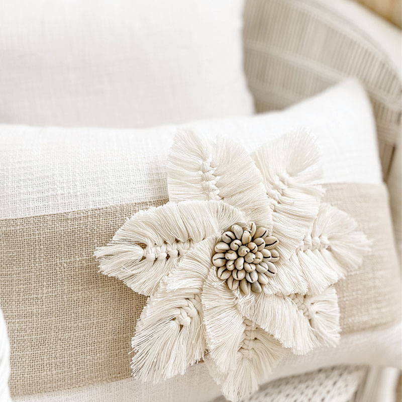 Boho cushions, featuring a macrame and shell Cushion Accessory.