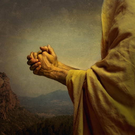 Painting of Jesus' hands clapsed in prayer. 