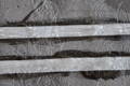 Graffiti removal from Stained Concrete Bike Path Grating