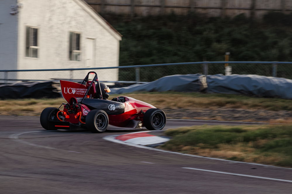 Panning shot of car through a turn