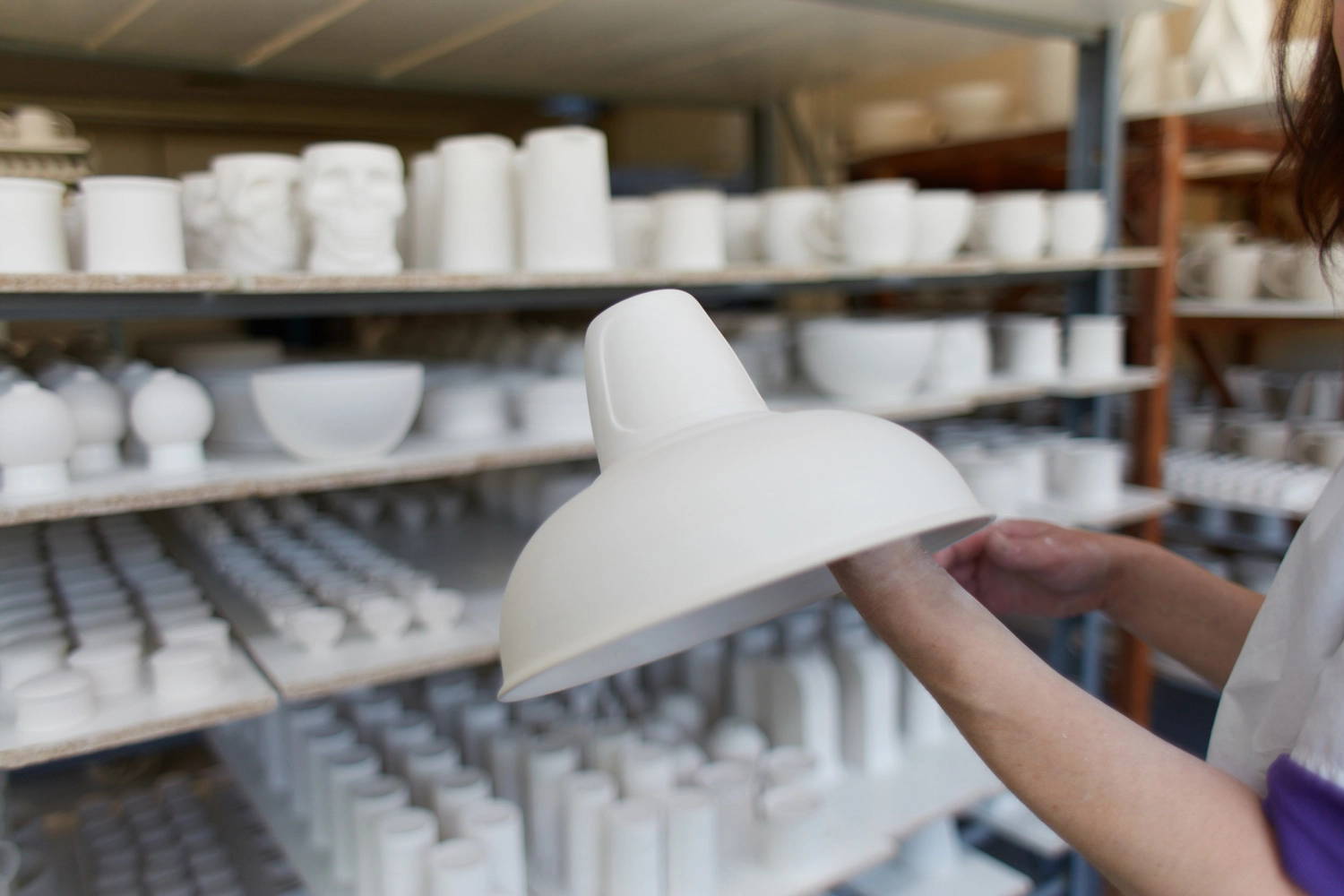 A matte white Bone China lampshade before being fired