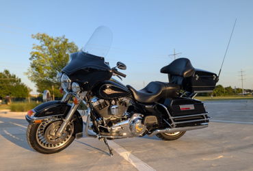2011 HARLEY-DAVIDSON FLHTC ELECTRA GLIDE CLASSIC (BLACK) motorcycle for rent near Frisco, TX