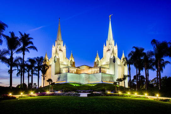 San Diego Temple glowing against the night sky.