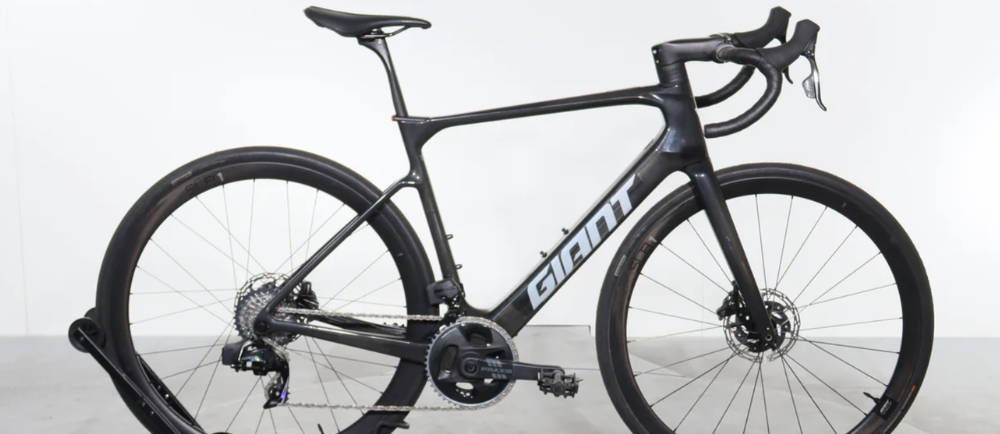 a black Giant Defy Advanced E+ Elite 1 electric road bike