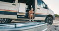 Photo of Dad, Son and dog in front of an adventure van. [Luke, Dad & Pickles]