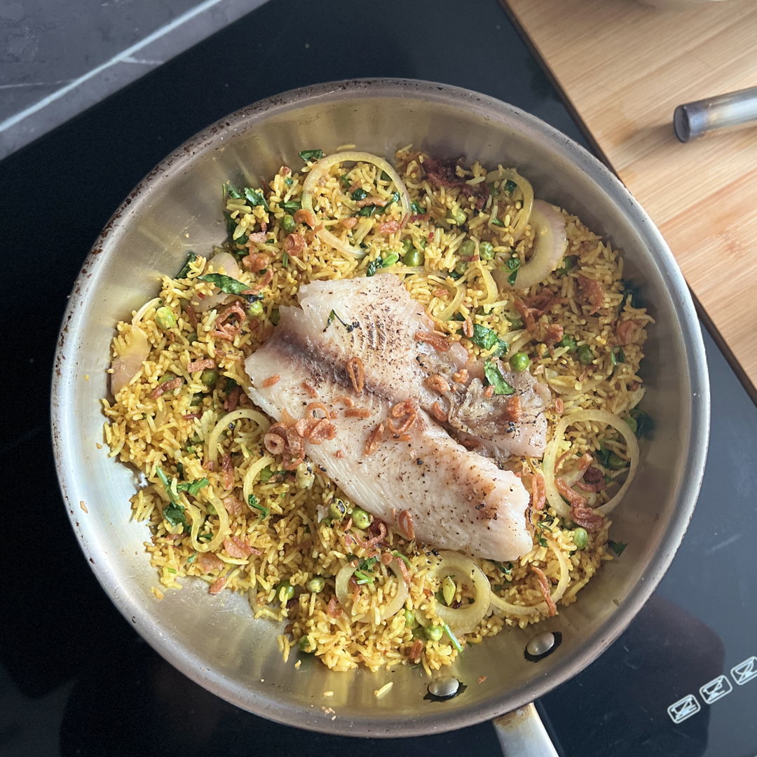 Quick 30 mins curry-spiced fried rice with a pan-fried fish. Cooked with one pan.