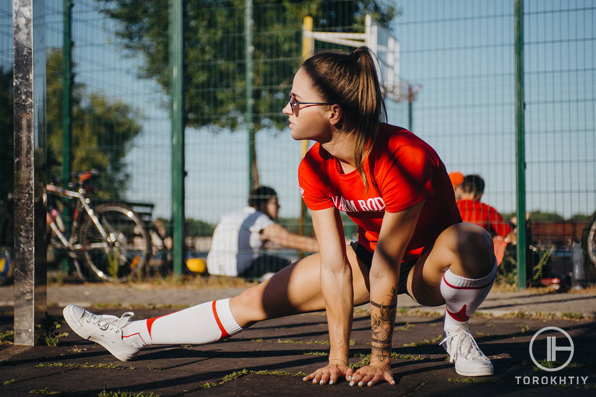 WBCM stretching by young woman WBCM stretching by young woman