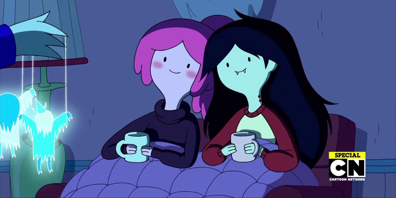Image of Princess Bubblegum and Marcelene sitting up on the bed and watching something while they have mugs in their hands.
