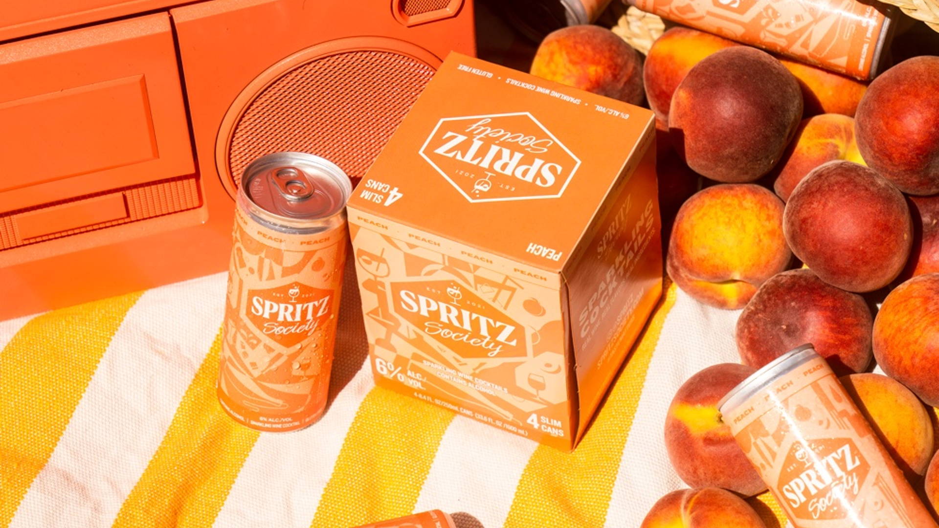 Featured image for Can You Put Summer In a Can? Spritz Society Releases New Peach Flavor