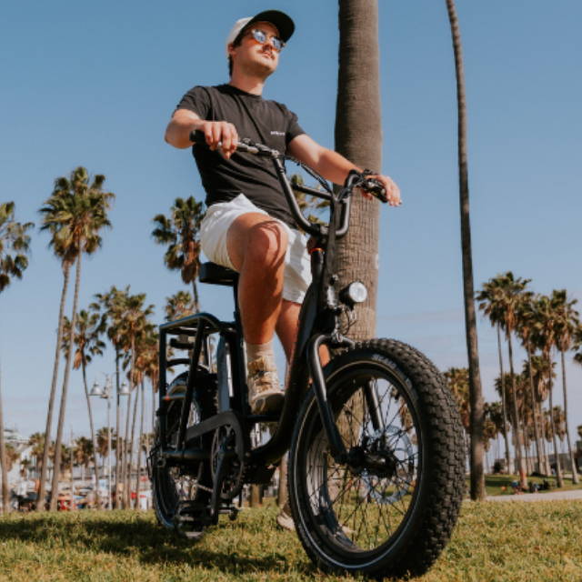 a man riding a Rad Power electric bike in southern california
