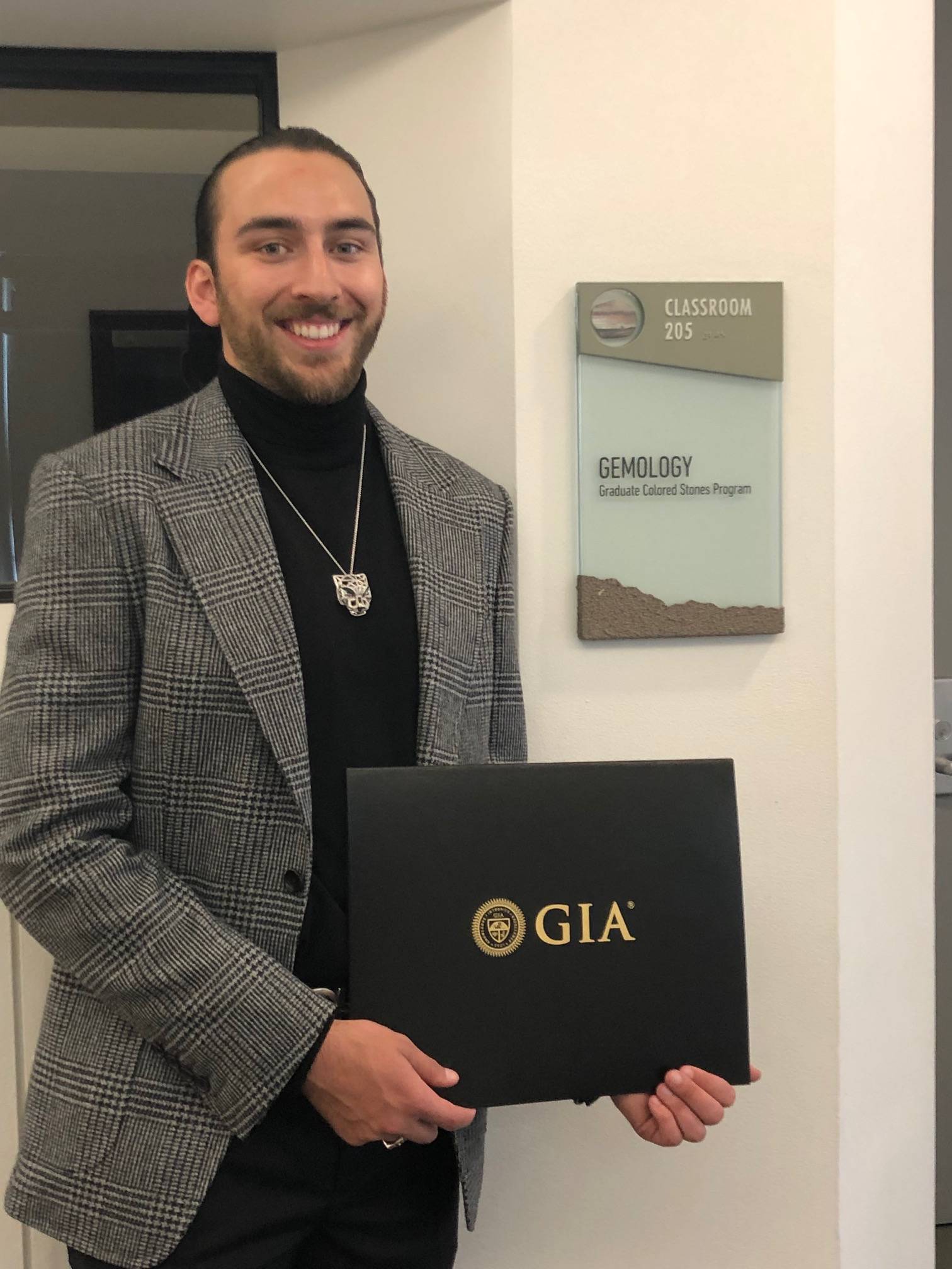 AJ with his GIA certification