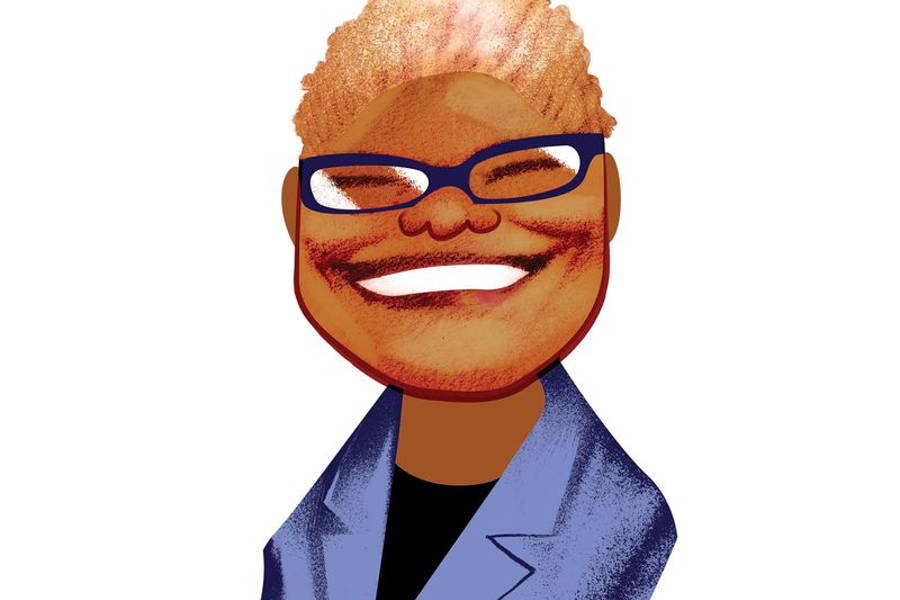 Image may contain: Accessories, Glasses, Face, Head, Person, Photography, Portrait, Happy, Smile, Adult, Clothing, and Coat