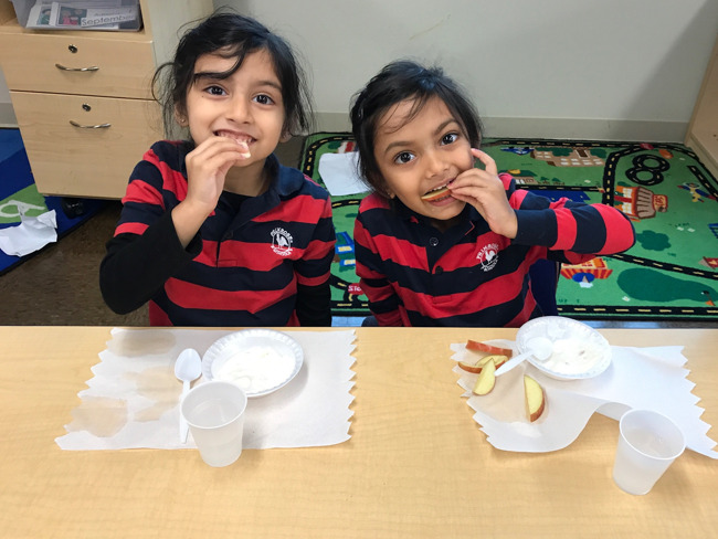Pre-Kindergarten students CRUNCH local apples
