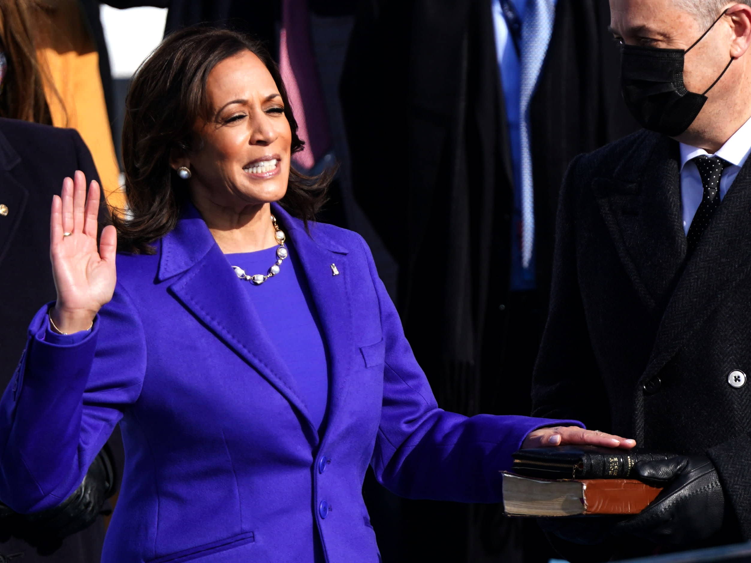 Kamala Harris is the first woman in history to be sworn in as Vice-President of the USA wearing a purple coat