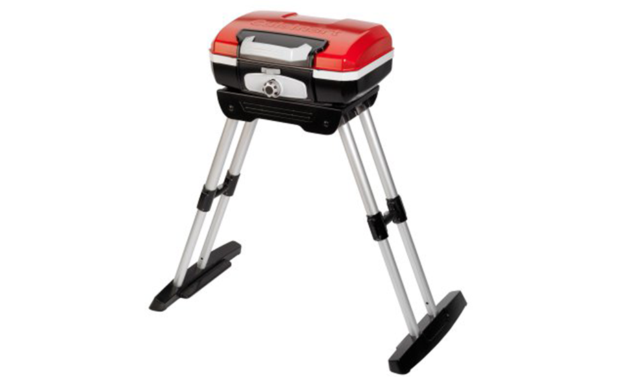 Small red portable grill with collapsable legs