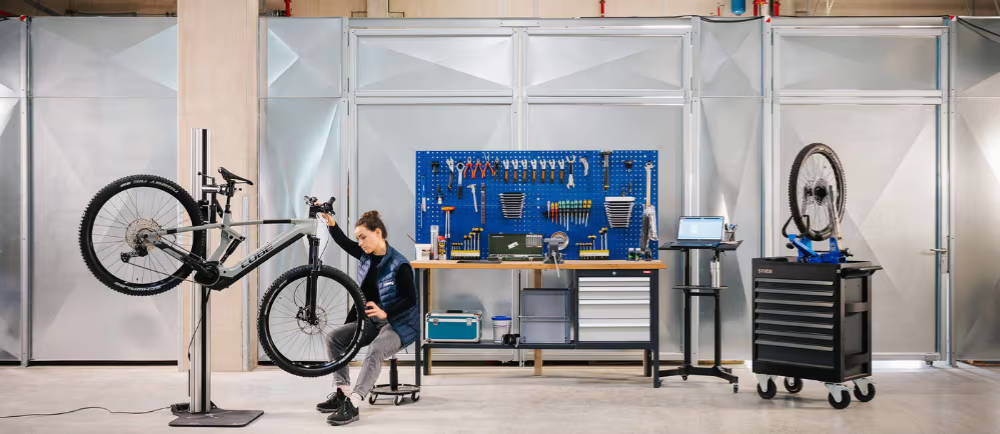 Upway mechanic repairing e-Bike