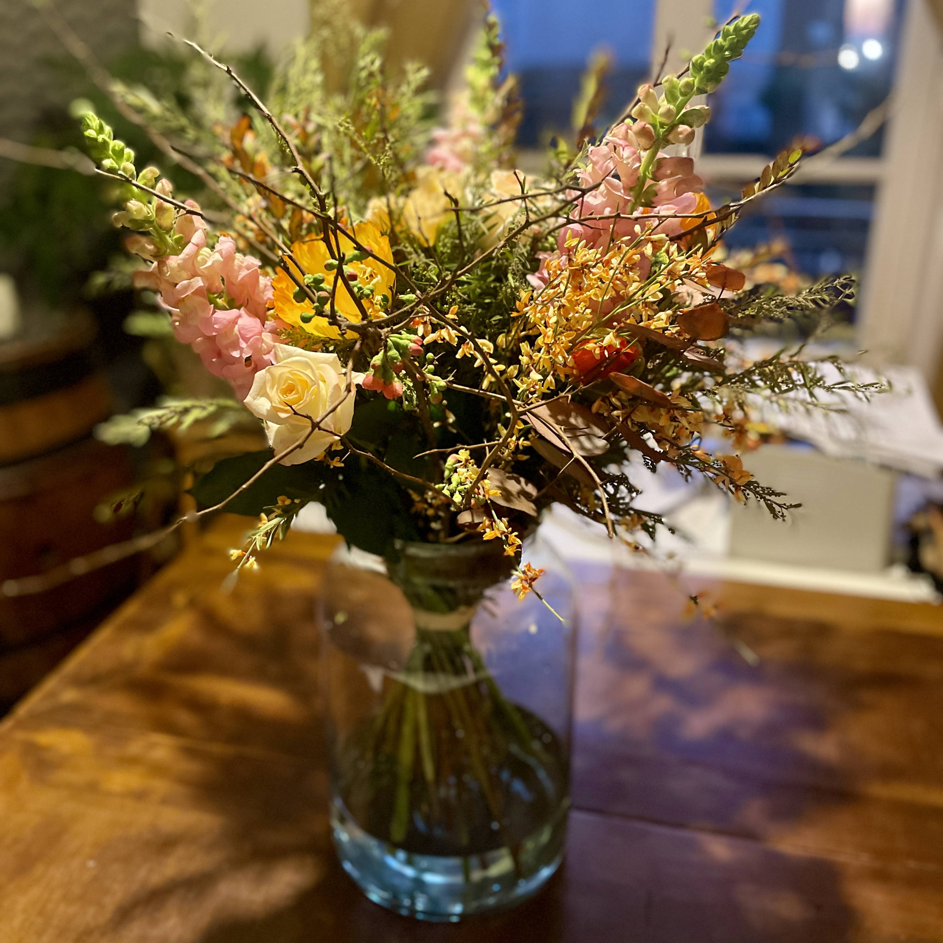 Bouquet tons orangers et roses