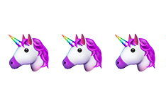 3 Emojis of unicorn heads with purple mane.