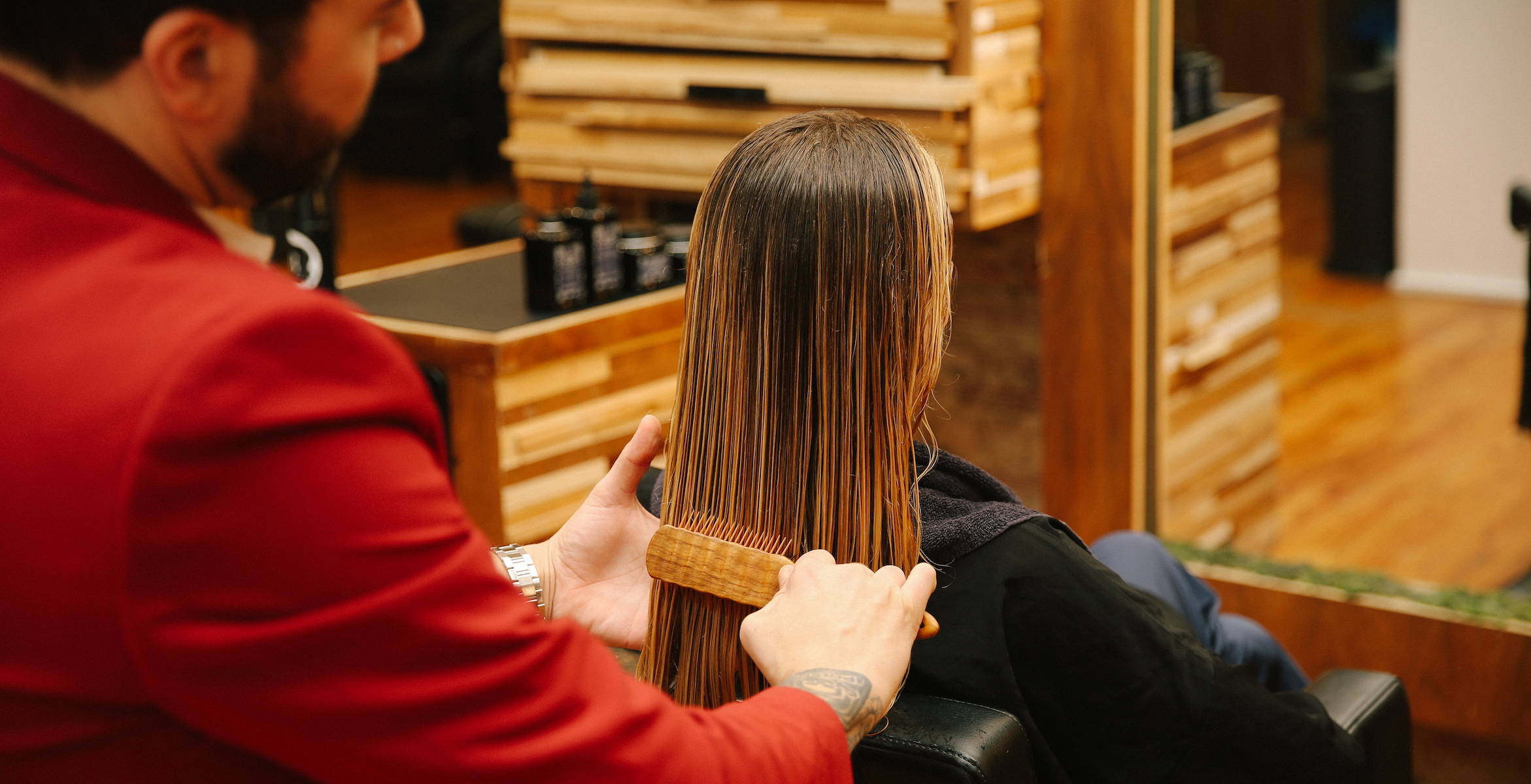 Brushing hair in Davines salon stylist