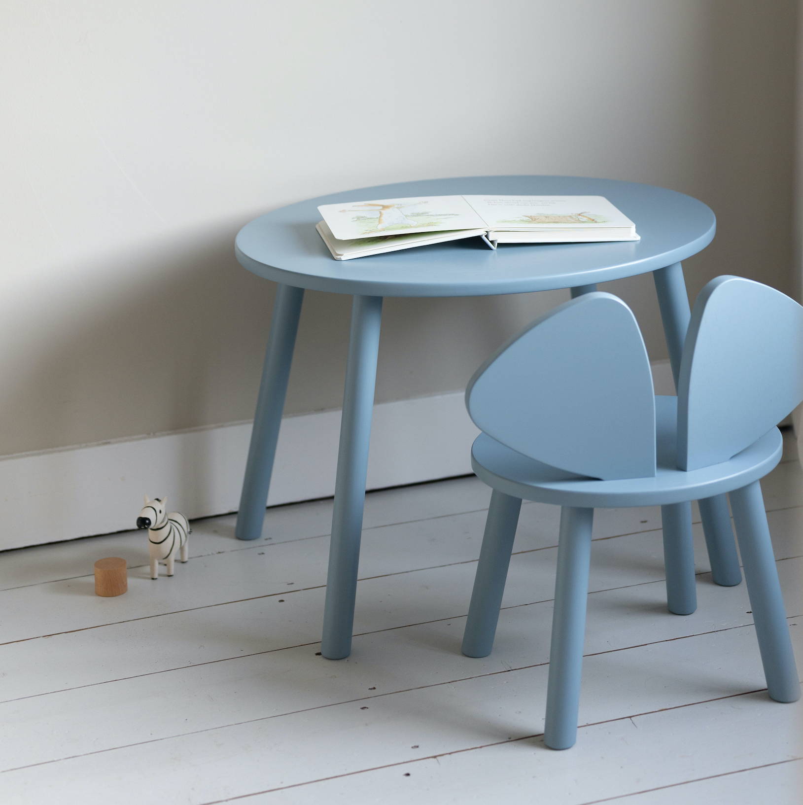 Kids toddler chair and table in light blue in the kids room