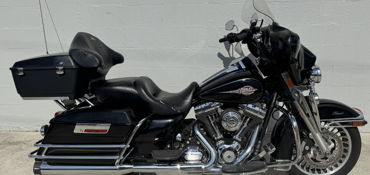 2013 HARLEY-DAVIDSON FLHTC ELECTRA GLIDE CLASSIC (VIVID BLACK) motorcycle for rent near Ruskin, FL