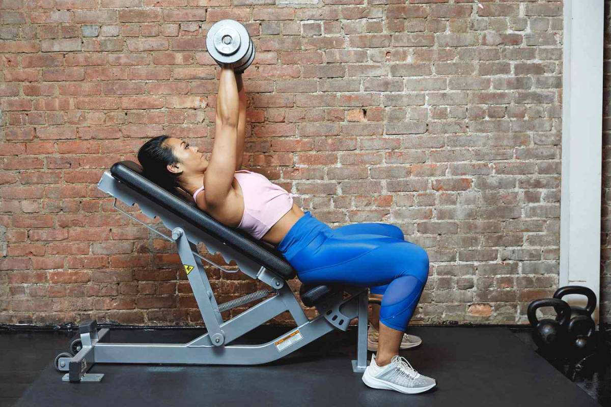 athlete exercising on the bench weight